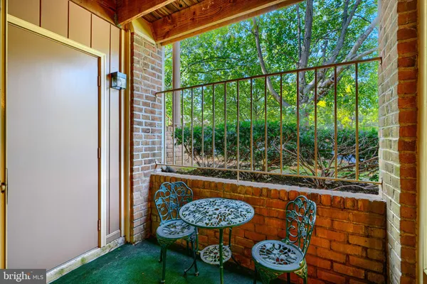 a outdoor view with a sitting space and furniture