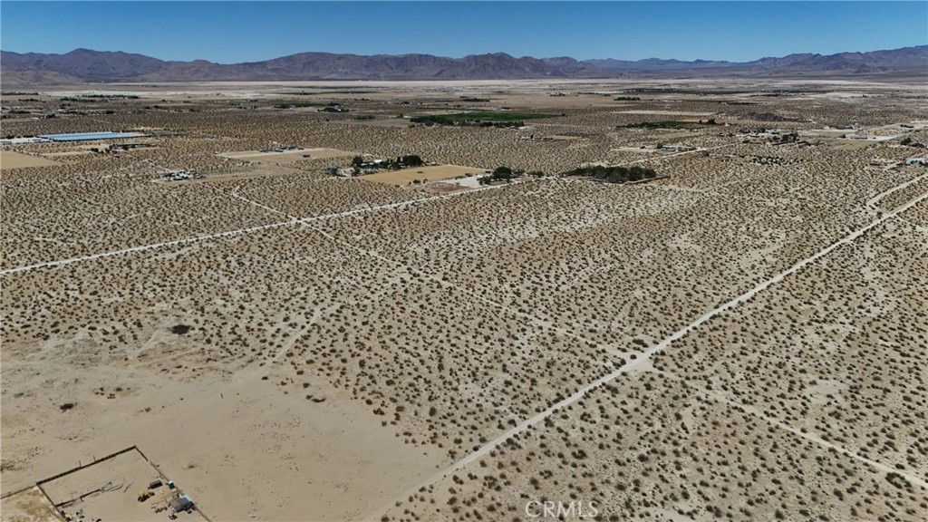 712 Fairlane Road Lucerne Valley, CA 92356 - Photo 3 of 12 a view of an ocean beach and mountain