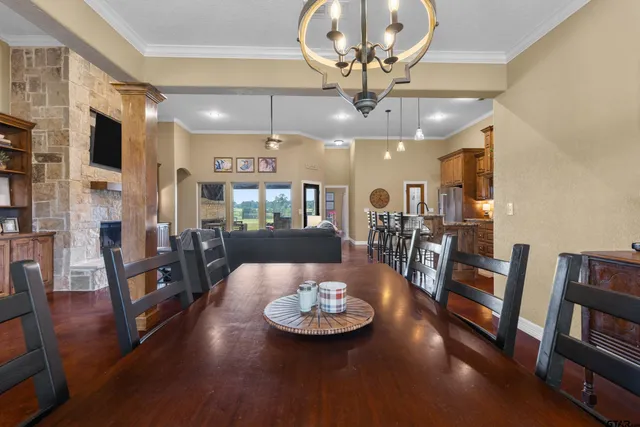 a view of walk in closet with clothes