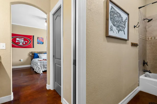 a front view of a house with a garden and porch