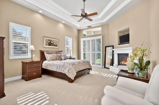 a bed room with a bed and a chair