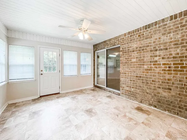 a view of a park with large trees