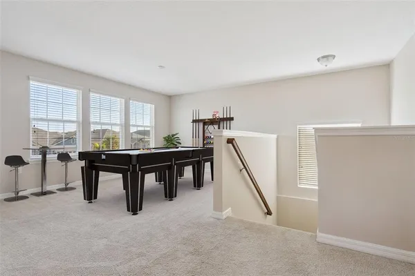 a workspace with furniture and window