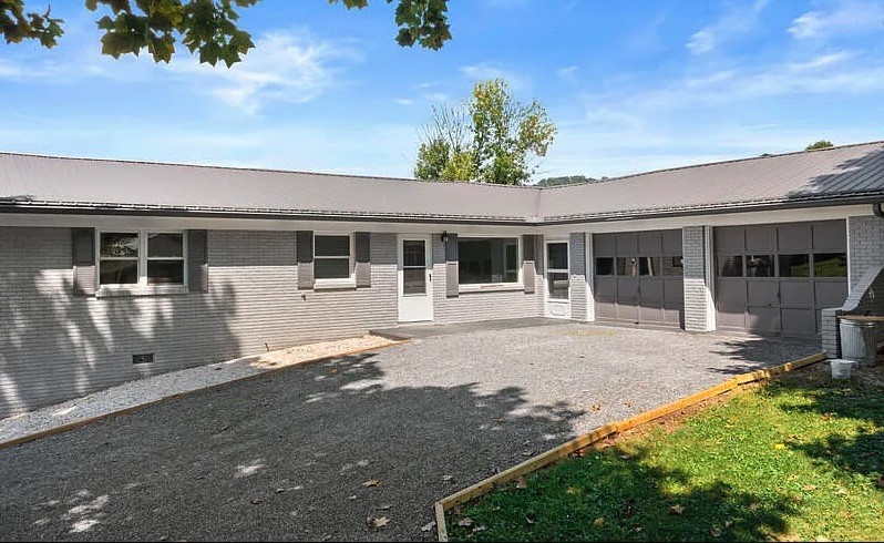 front view of a house with a patio