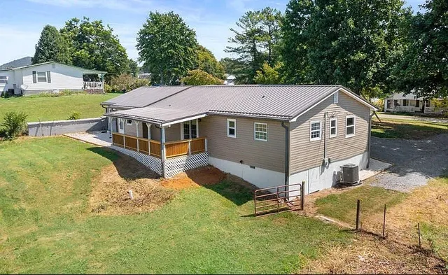 a view of a back yard from a balcony