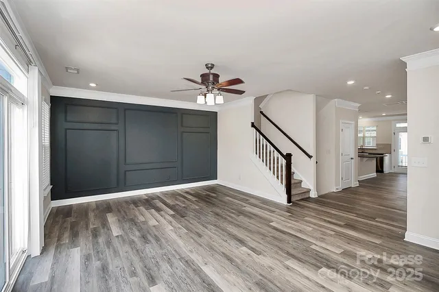 a view of a hallway view with staircase