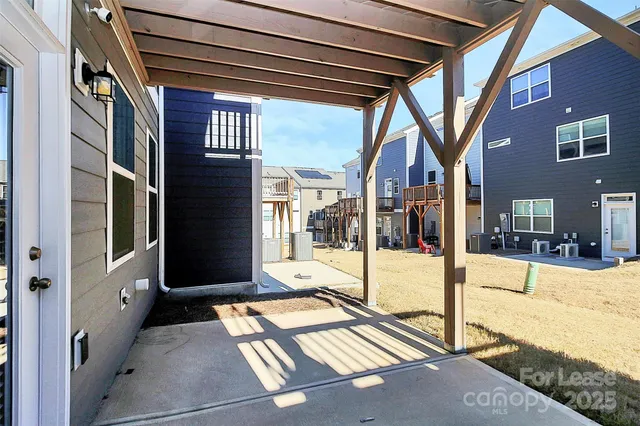 a building outdoor space with balcony and furniture