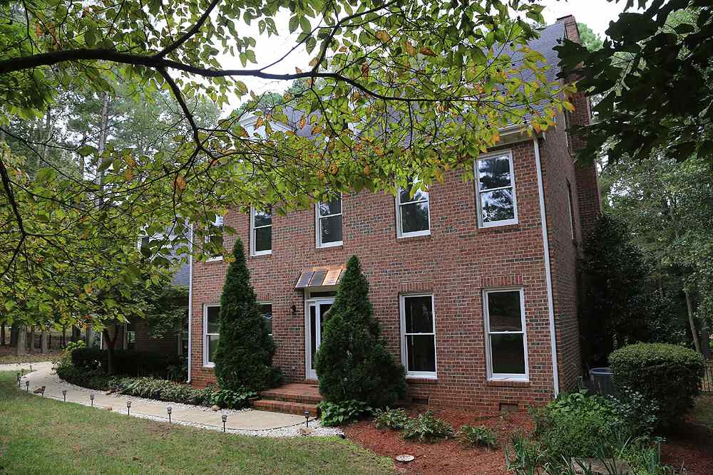 9001 Hemingwood Court Raleigh, NC 27613 - Photo 3 of 25 Brick on three sides of this gorgeous home another shot of the front. Exterior Front