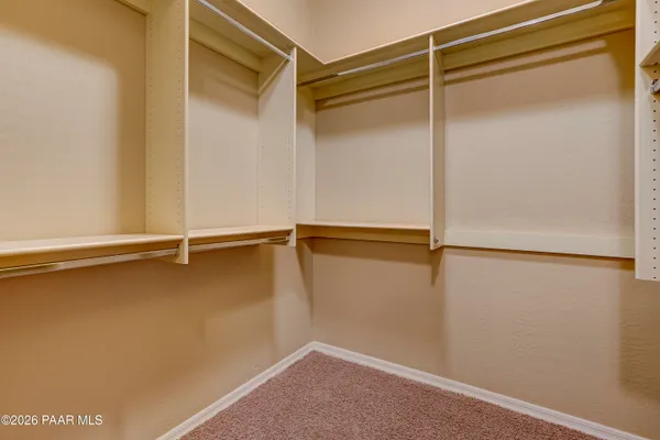a view of a room with racks on the wall