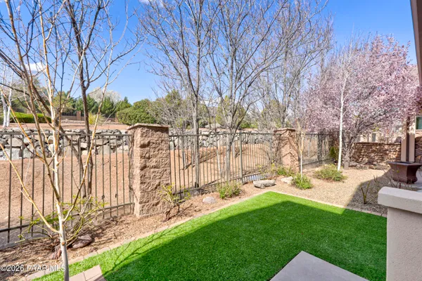 a view of yard with large tree