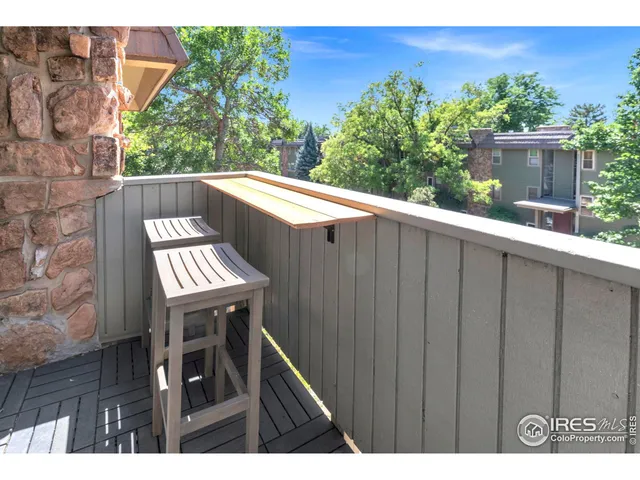 a balcony with an outdoor space