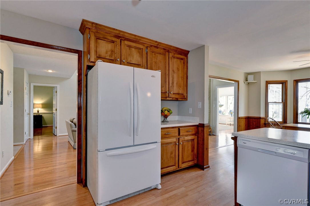 110 Westminster Place Williamsburg, VA 23188 - Photo 31 of 50 a kitchen with stainless steel appliances a refrigerator and wooden floor