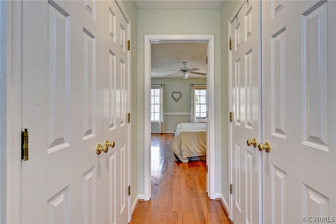 110 Westminster Place Williamsburg, VA 23188 - Photo 40 of 50 a view of a hallway with wooden floor and closet