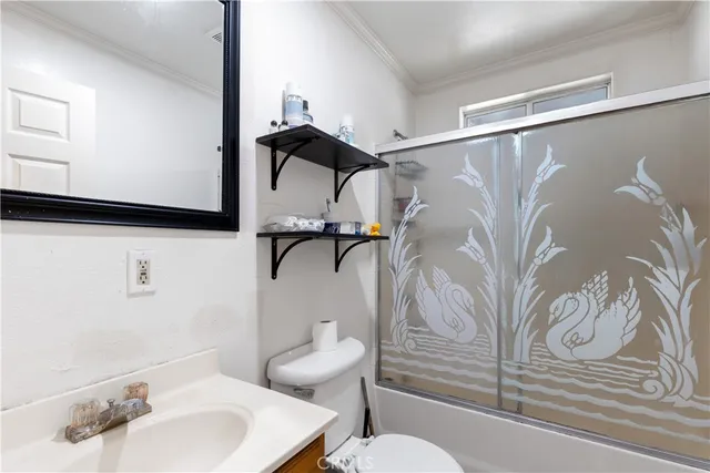 a bedroom with a bed and a closet