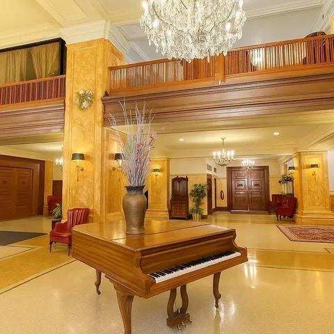 a view of a garage with cars