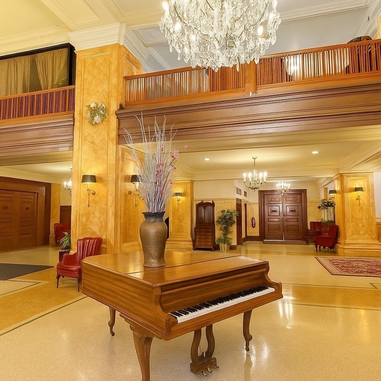 140 Chestnut Street, Unit 709 Springfield, MA 01103 - Photo 15 of 18 a view of a patio with swimming pool table and chairs