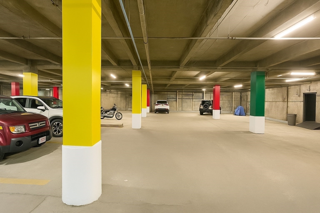 140 Chestnut Street, Unit 709 Springfield, MA 01103 - Photo 17 of 18 a view of a garage with cars