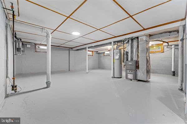 2164 Wh-ham Square Hamilton, NJ 08690 - Photo 28 of 40 Basement with heat and hot water units