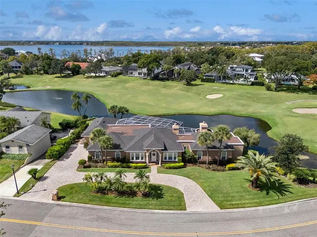 an aerial view of a house with a garden