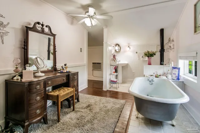 a front view of a house with a yard table and chairs
