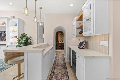 a view of living room with a sink and dishwasher