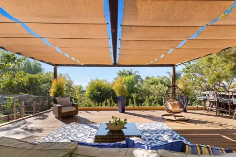 a view of a swimming pool with a patio