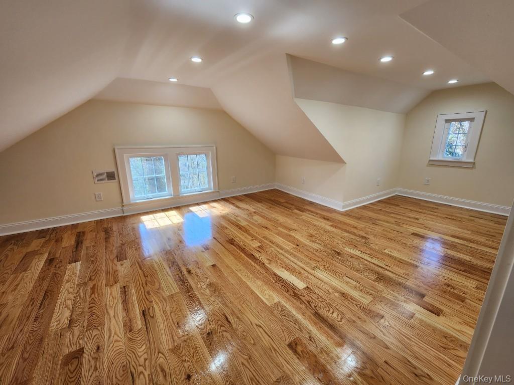 20 North Ravine Road Kings Point, NY 11023 - Photo 28 of 49 a view of empty room with wooden floor and fan