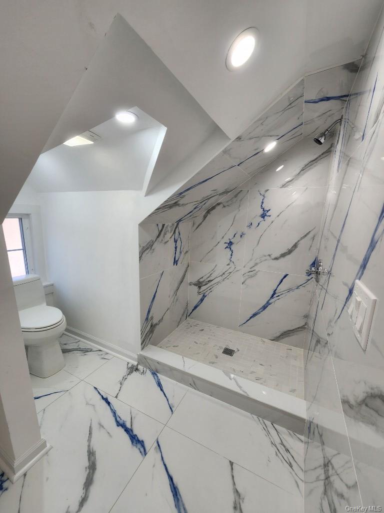 20 North Ravine Road Kings Point, NY 11023 - Photo 29 of 49 a bathroom with a toilet sink and shower