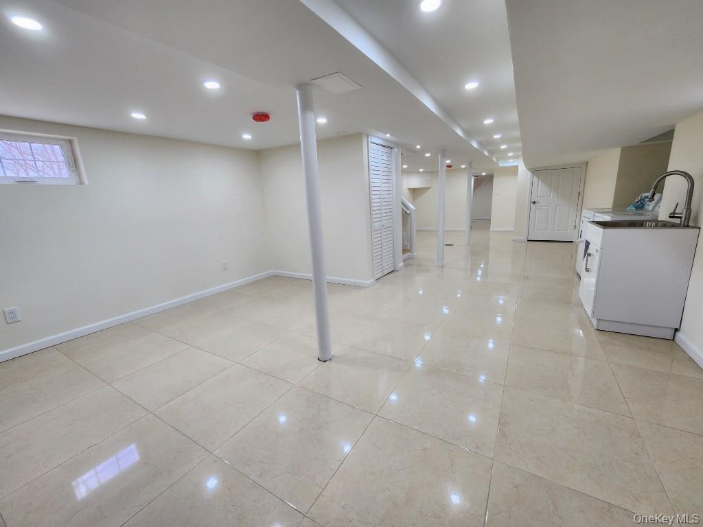 20 North Ravine Road Kings Point, NY 11023 - Photo 38 of 49 a view of a hallway with wooden floor
