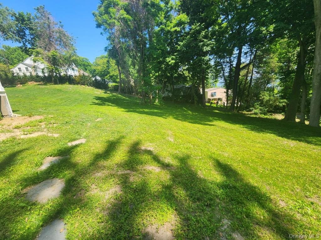 20 North Ravine Road Kings Point, NY 11023 - Photo 4 of 49 a view of field with trees in the background