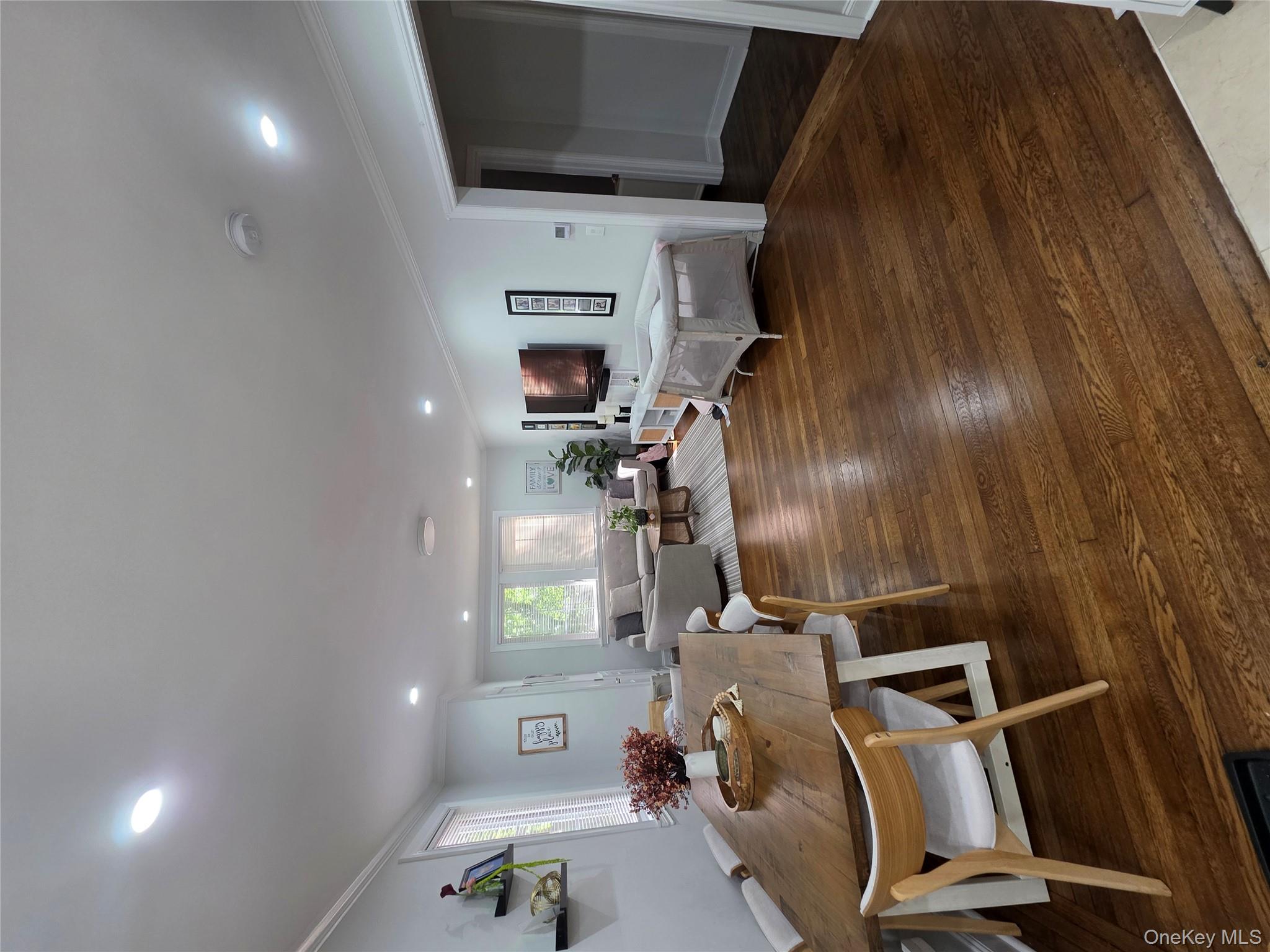 20 North Ravine Road Kings Point, NY 11023 - Photo 43 of 49 a living room with furniture and a flat screen tv