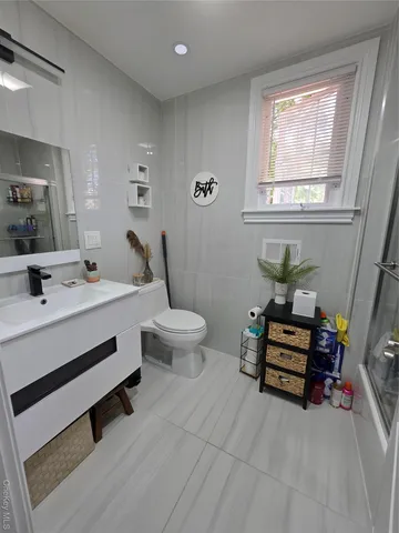 a room with a bed and a window