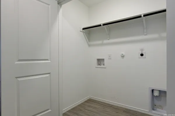 a view of small space with racks on the wall