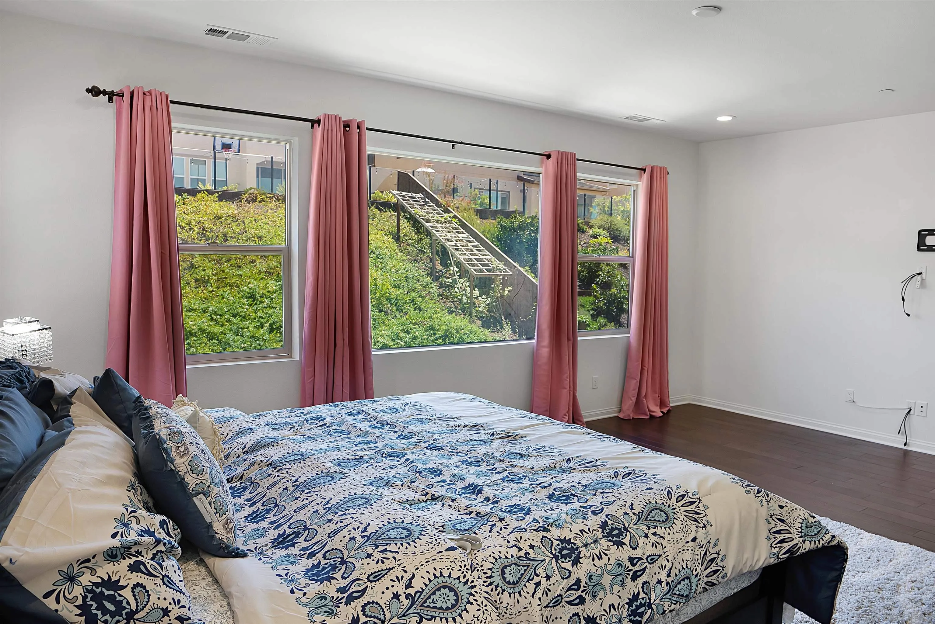 15901 Sarah Ridge Road San Diego, CA 92127 - Photo 17 of 34 a bedroom with a bed and a window