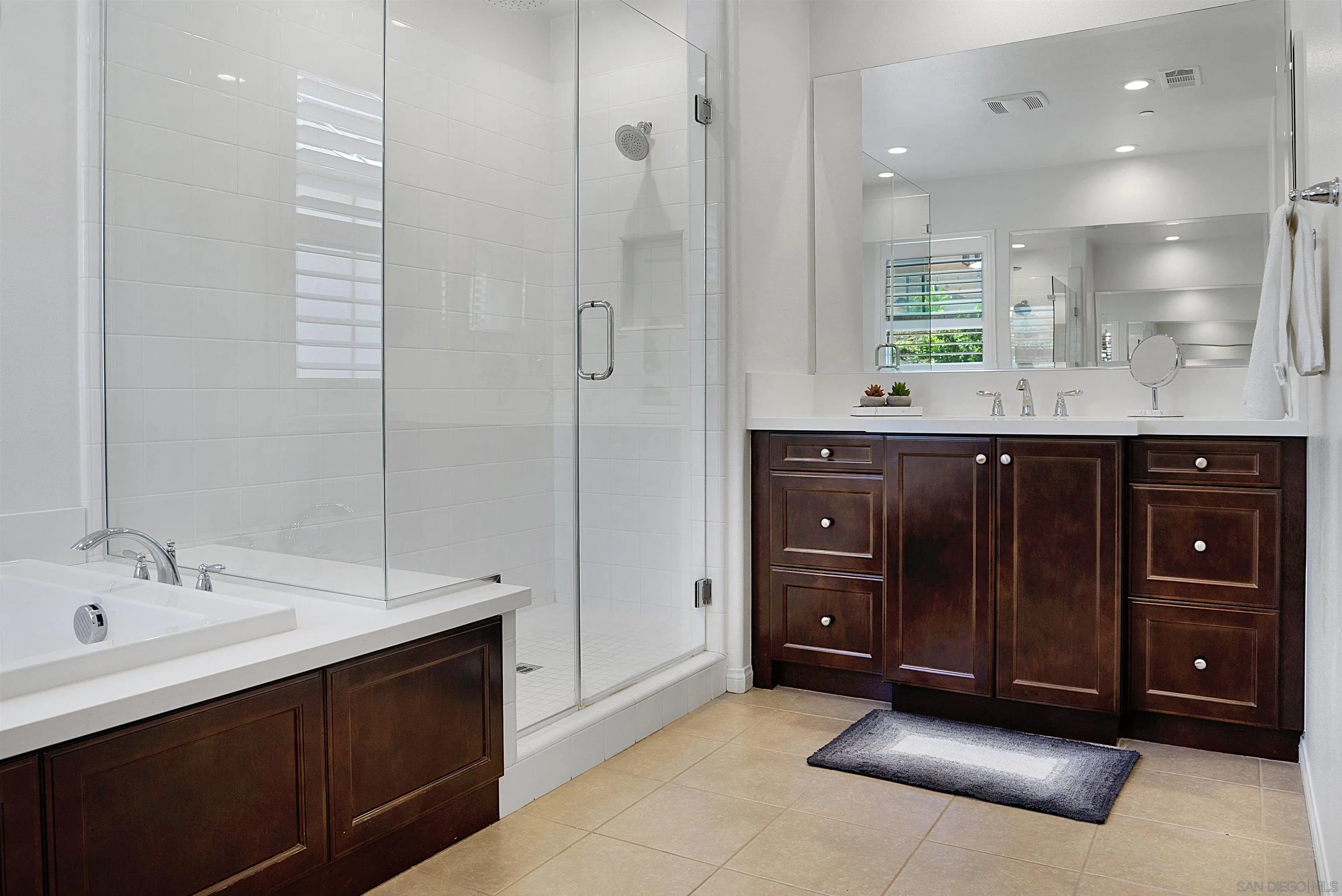15901 Sarah Ridge Road San Diego, CA 92127 - Photo 20 of 34 a bathroom with a sink and a mirror