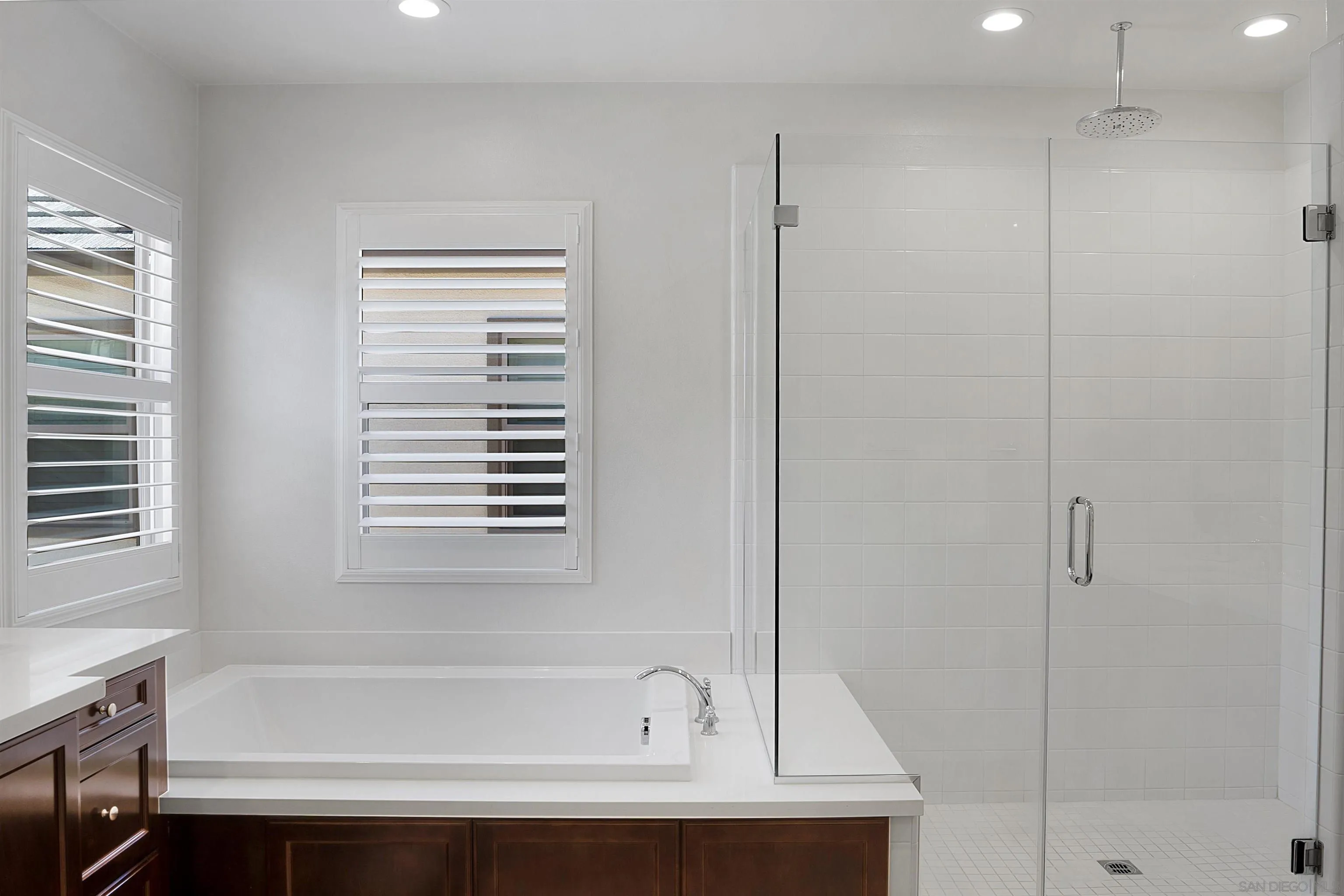 15901 Sarah Ridge Road San Diego, CA 92127 - Photo 21 of 34 a bathroom with a bathtub and a shower