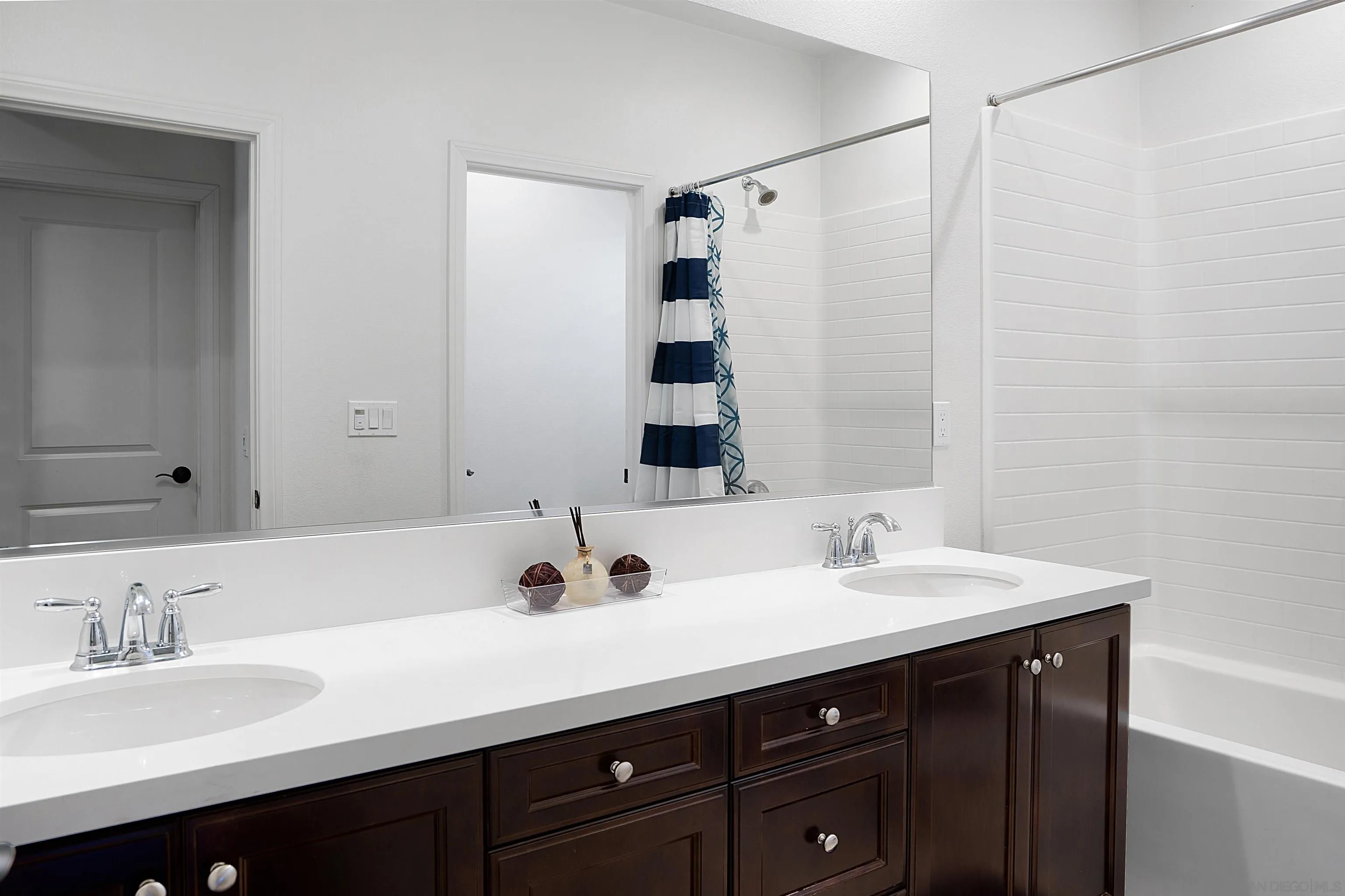 15901 Sarah Ridge Road San Diego, CA 92127 - Photo 25 of 34 a bathroom with a sink and a mirror