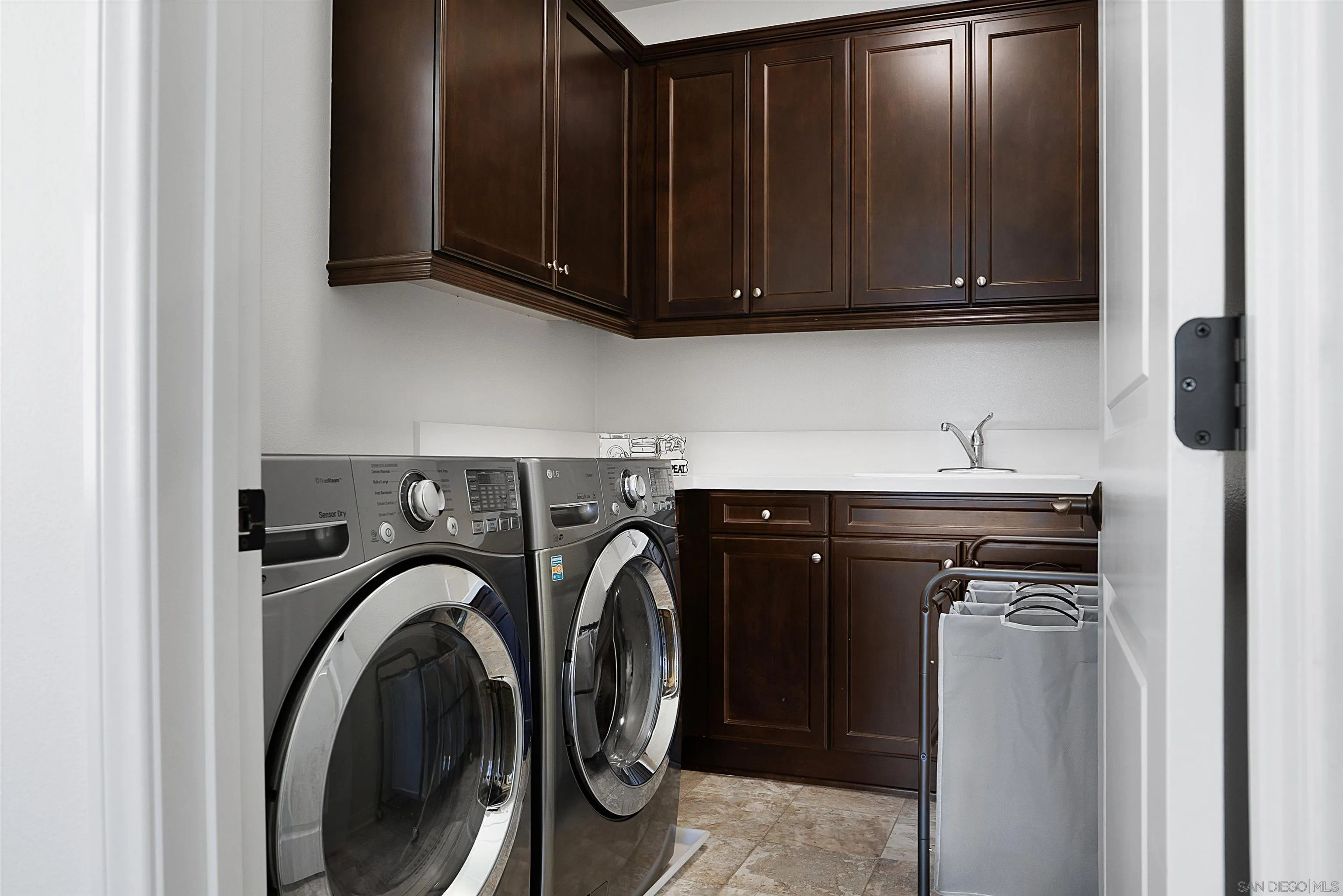 15901 Sarah Ridge Road San Diego, CA 92127 - Photo 26 of 34 a utility room with dryer and washer