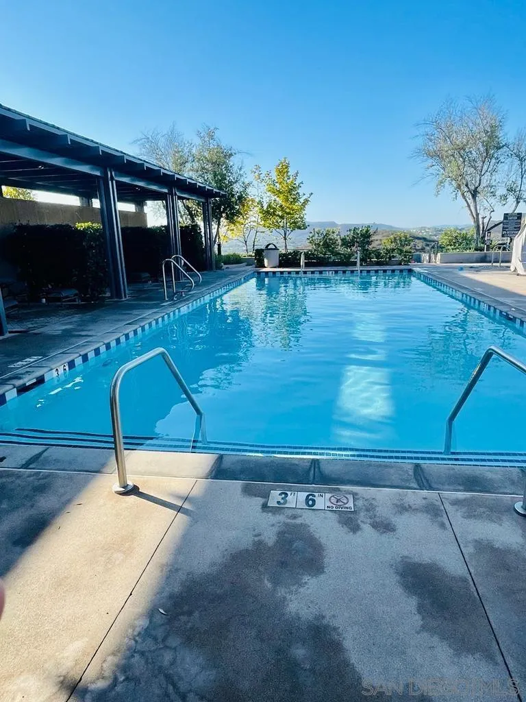 15901 Sarah Ridge Road San Diego, CA 92127 - Photo 4 of 34 a swimming pool with barbeque oven