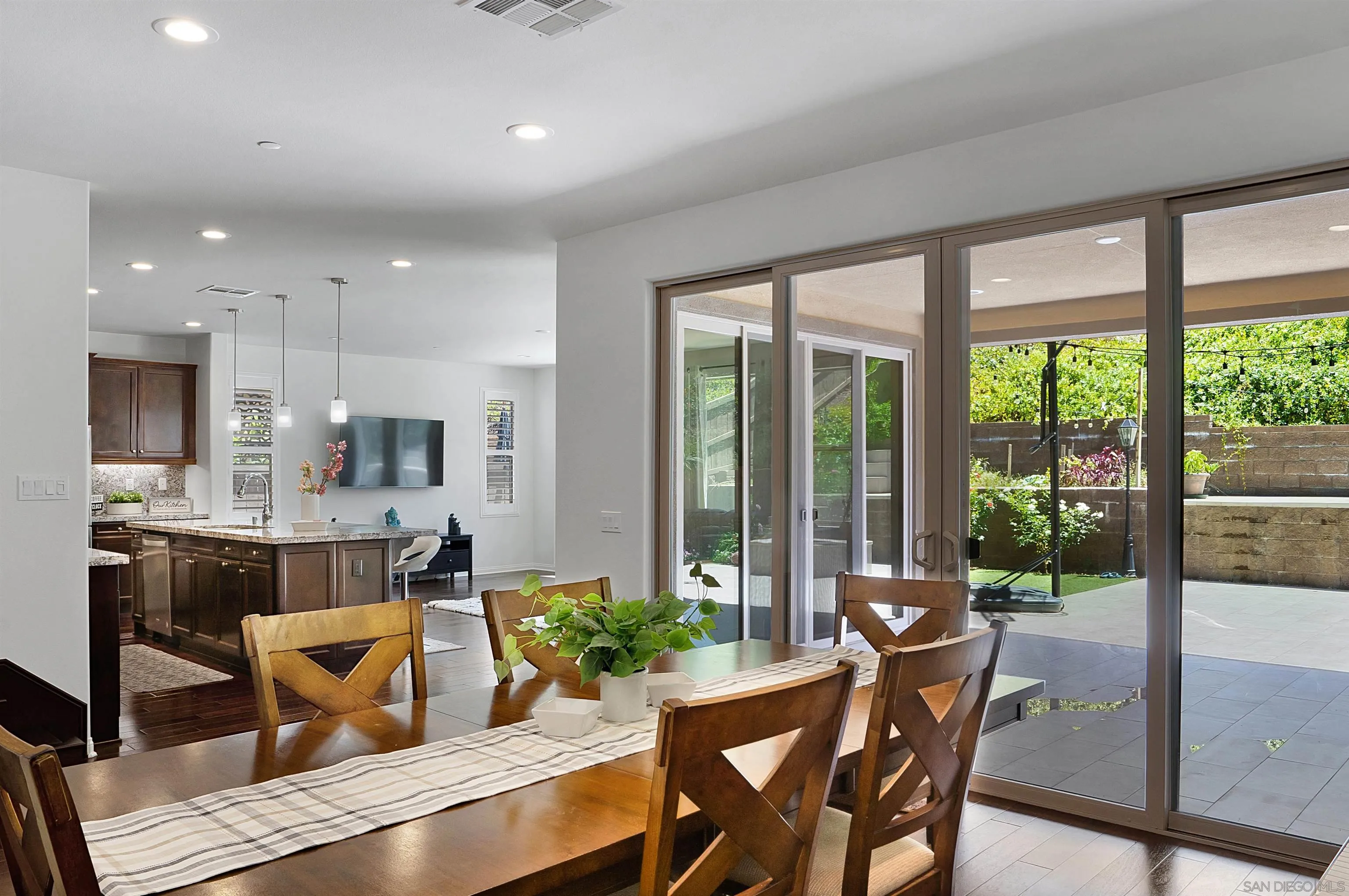 15901 Sarah Ridge Road San Diego, CA 92127 - Photo 10 of 34 a dining room with furniture and a large window