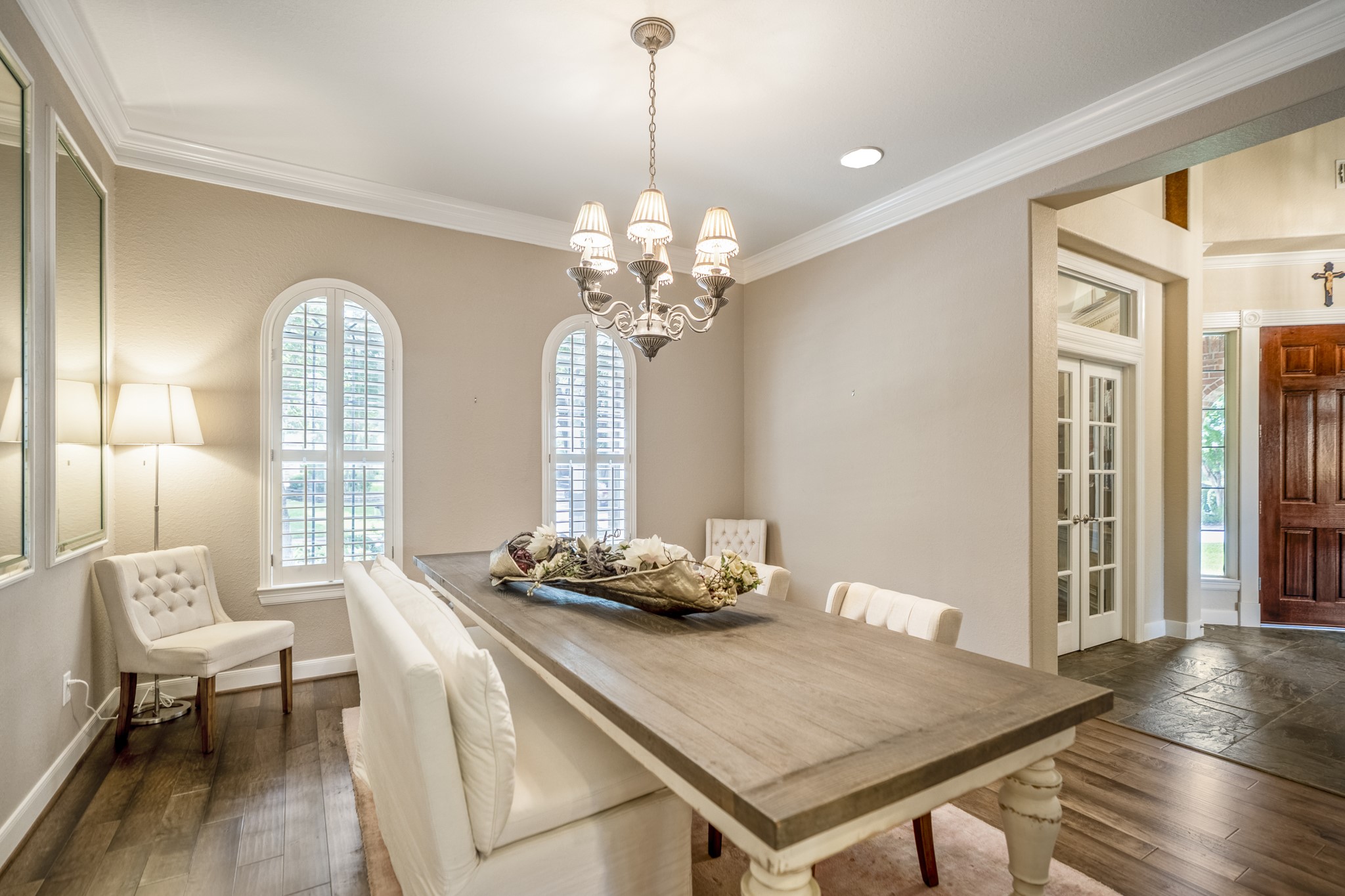 67 North Pentenwell Circle Spring, TX 77382 - Photo 6 of 50 a view of a dining room with furniture and wooden floor