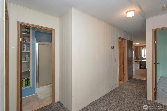 a white toilet sitting next to a bathroom sink