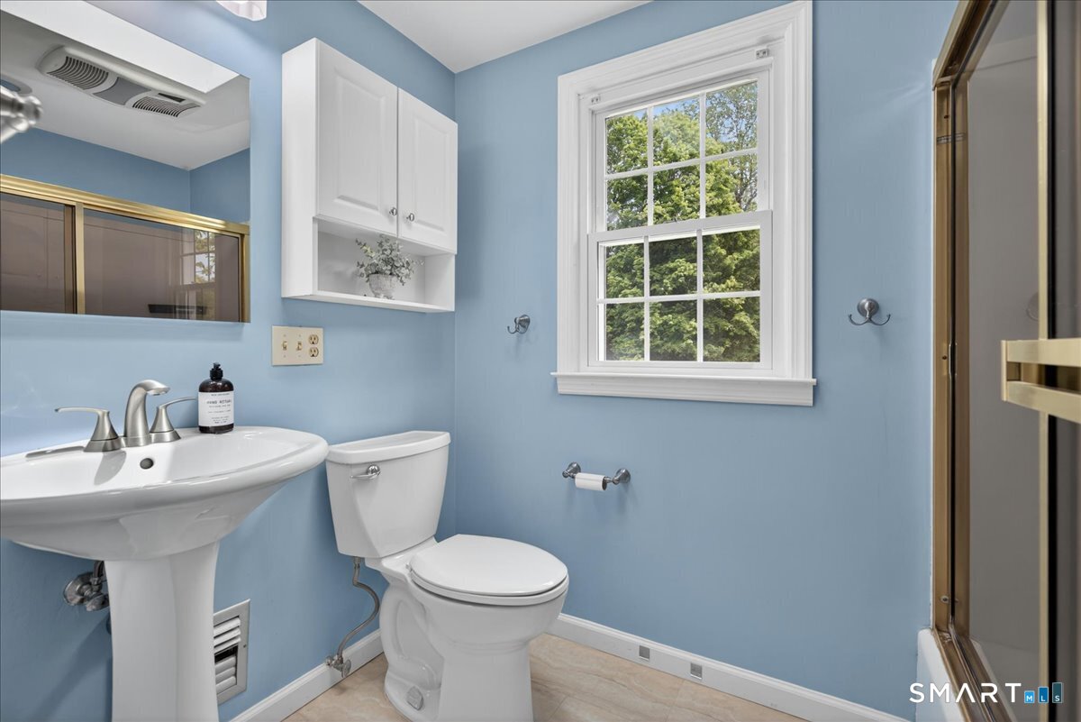 1006 King Road Cheshire, CT 06410 - Photo 23 of 40 The updated Full Bathroom has a skylight and shower/tub combo.