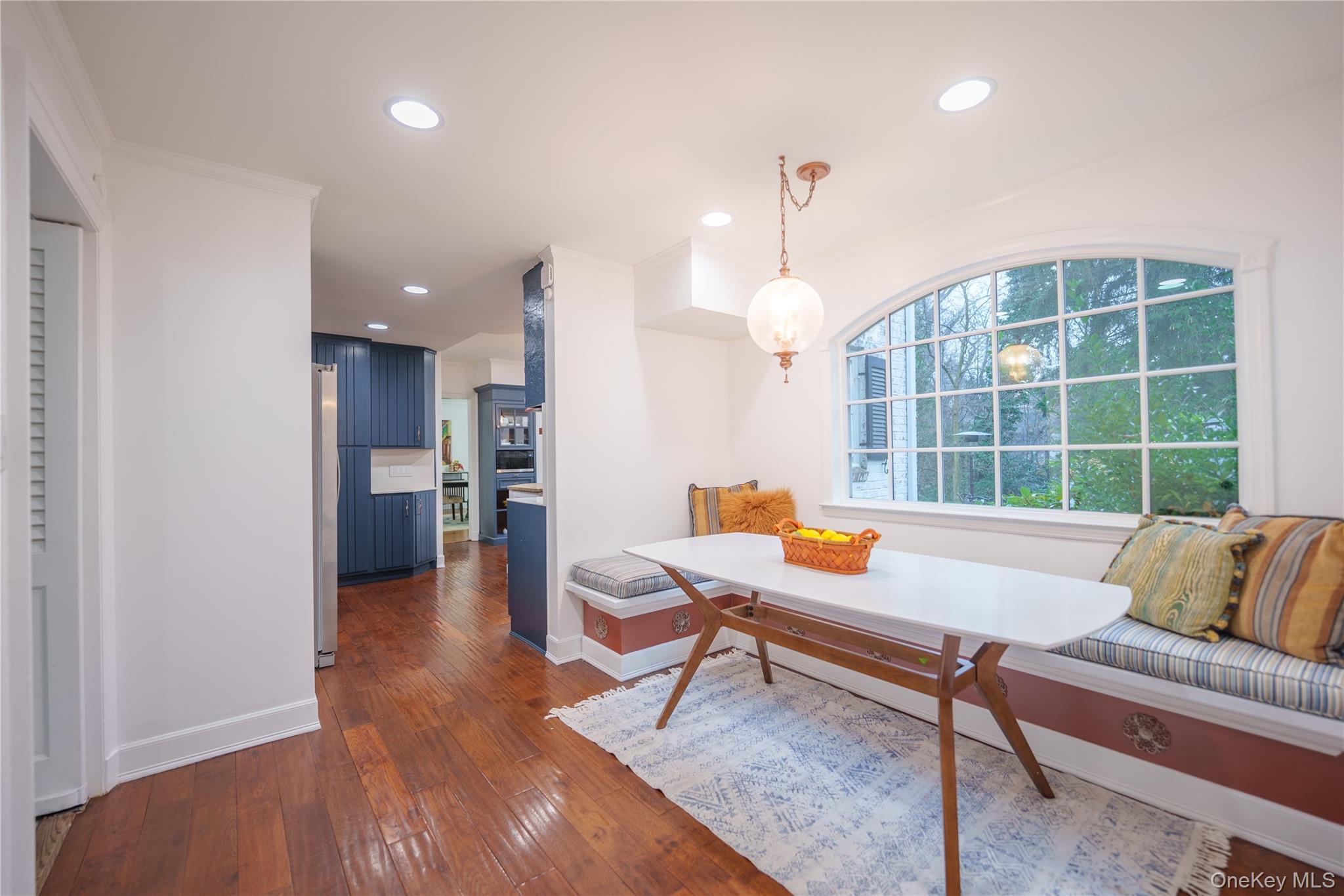 10 Hidden Pond Muttontown, NY 11545 - Photo 19 of 46 a living room with furniture and a large window