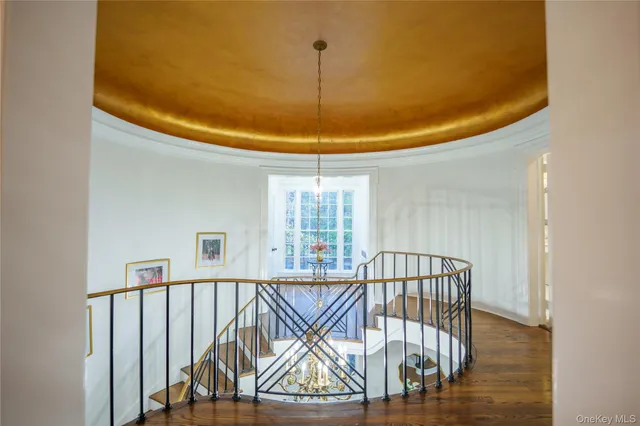 a view of staircase with furniture