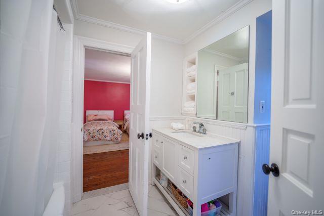 10 Hidden Pond Muttontown, NY 11545 - Photo 30 of 46 a bathroom with a sink and a mirror