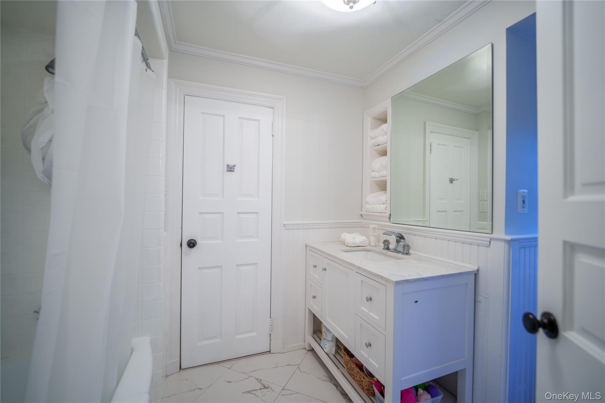 10 Hidden Pond Muttontown, NY 11545 - Photo 31 of 46 a bathroom with a sink and a mirror