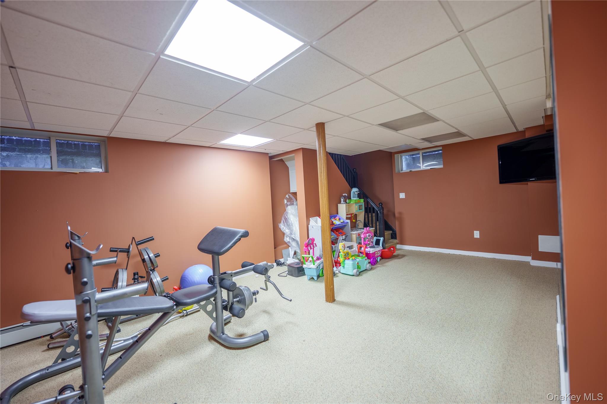 10 Hidden Pond Muttontown, NY 11545 - Photo 44 of 46 a view of gym equipment in a room