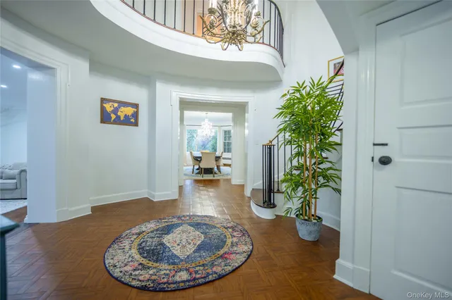 a view of a hallway with potted plants
