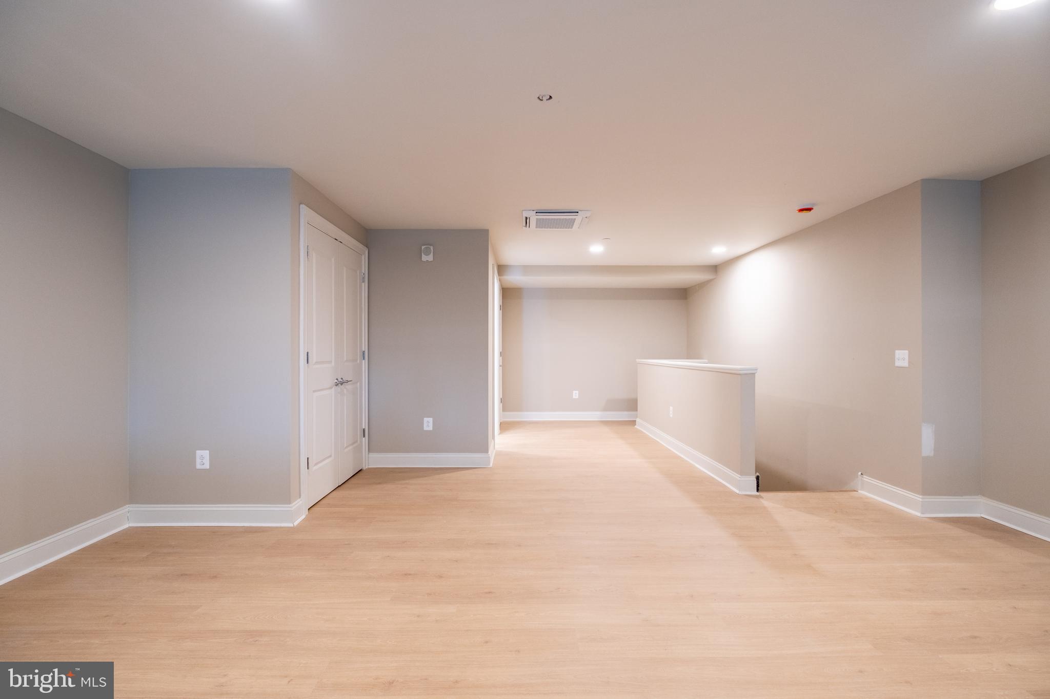 2301-61 John F Kennedy Boulevard, Unit 201 Philadelphia, PA 19103 - Photo 35 of 36 a view of a livingroom with a staircase